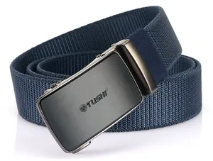 Close-up of matte grey automatic buckle with TUSHI logo on navy blue nylon tactical belt