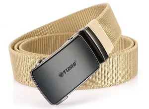 Detail of khaki nylon belt with matte grey automatic metal buckle and engraved logo