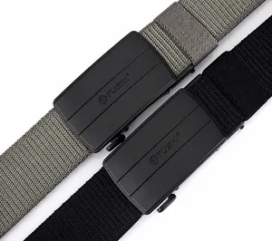 Close-up of tactical nylon belts with matte black automatic buckles and woven texture