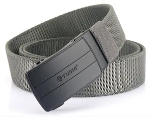 Detail of grey nylon stretch belt with matte black automatic buckle and TUSHI logo