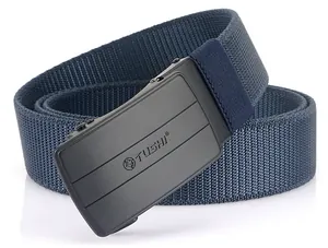 Close-up of matte black automatic buckle with TUSHI logo on a blue elastic nylon belt