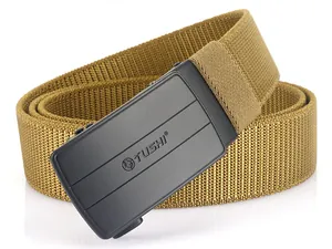 Detailed macro view of khaki nylon elastic tactical belt with matte black metal buckle