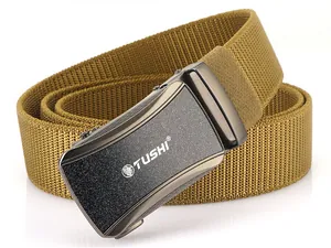 Detail of khaki woven nylon belt with alloy automatic buckle and laser-etched wolf logo