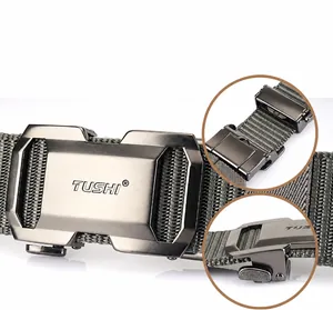 Detail of grey woven nylon belt showing the automatic metal buckle and texture