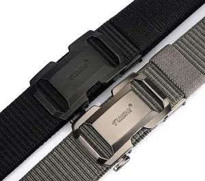 Detail of outdoor tactical nylon belts with automatic metal buckles in black and olive
