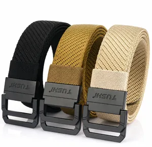 Close-up of black, khaki, and beige woven nylon belts with matte black double-ring buckles