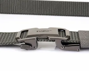Detail showing the matte metal automatic buckle and grey woven nylon tactical belt