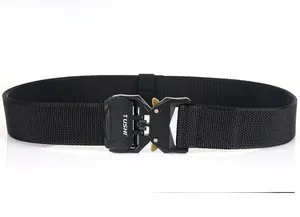 Detail of a durable nylon tactical belt featuring a metal quick-release buckle and TUSHI logo