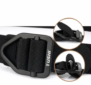 Tactical nylon belt detail showing quick-release metal buckle and woven strap texture