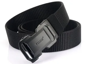Detail of black nylon belt with matte metal automatic buckle and textured weave pattern