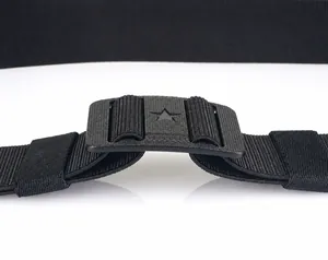 Close-up of tactical nylon belt buckle with adjustable slider and star emblem detail