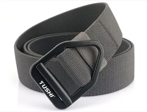 Detail of a dark gray tactical woven belt with a matte black triangular metal buckle