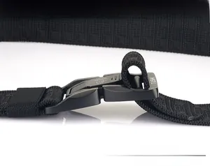 Close-up of quick-release buckle and adjustable nylon strap on a tactical belt