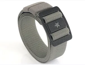 Detail of grey nylon tactical belt showing the matte black buckle with star emblem