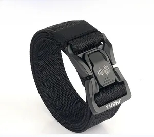 Close-up of black nylon tactical belt with metal quick-release buckle and woven texture