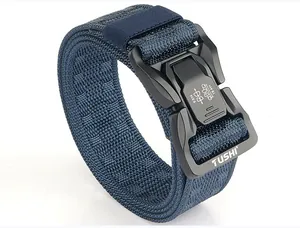 Detail of the quick-release metal buckle and navy nylon tactical belt texture