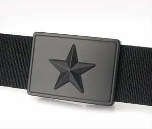 Detail of matte black zinc alloy buckle with embossed star on a tactical nylon belt