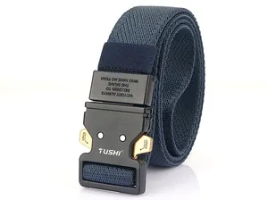 Detail of navy tactical belt with quick-release metal buckle and woven strap