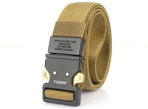 Detail of tan nylon tactical belt featuring a black alloy buckle with engraved motto