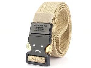 Detail of khaki tactical belt featuring a black metal quick-release buckle and nylon webbing