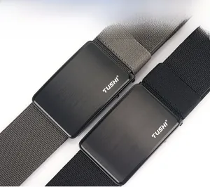 Detail of TUSHI nylon canvas belts with brushed black metal buckles and fabric texture