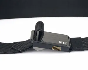 Detail of adjustable metal buckle and black nylon woven texture on tactical belt