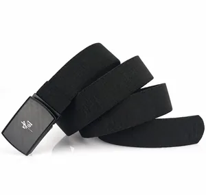 Macro view of black elastic canvas belt with durable polyester weave and metal buckle