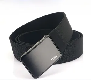 Detail of black nylon canvas belt with a brushed dark grey metallic TUSHI buckle