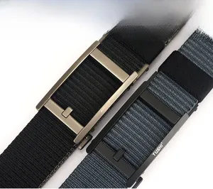 Detail of nylon canvas belts with brushed metal automatic buckle and woven texture