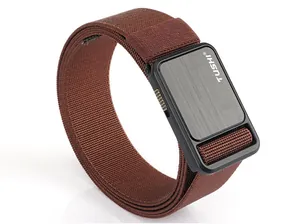 Close-up of tactical nylon stretch belt with brushed black metal buckle and logo