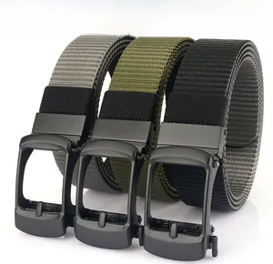 Detailed view of woven nylon belts in grey, green, and black with matte auto-buckles