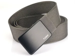 Detail of grey nylon canvas belt with a black metal buckle featuring the TUSHI logo