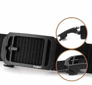 Detail of the rotating matte black metal buckle on a men's nylon tactical belt