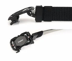 Detail of metal automatic buckle with TUSHI logo on double-sided thick nylon belt