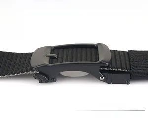 Detail of matte black metal buckle showing the adjustable mechanism of the nylon belt