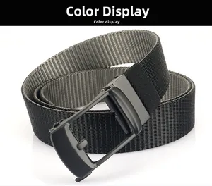 Detail view of coiled black nylon belt featuring a matte finish automatic buckle