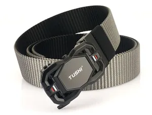 Macro shot of gray tactical nylon belt showing dense weave texture and black matte buckle