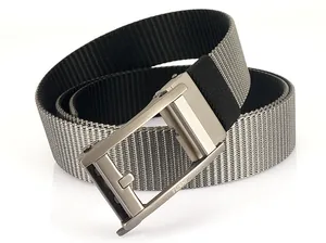 Detail of metal automatic buckle with brushed finish and dual-tone nylon woven strap