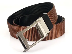 Detailed close-up of two-tone nylon canvas belt with matte metal automatic buckle