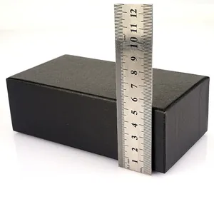 Elegant black rectangular gift box with premium leather texture and minimalist lid design