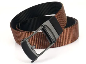 Detail of men's nylon belt featuring a textured two-tone weave and matte gunmetal buckle