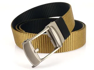 Detail of khaki nylon belt with automatic matte silver buckle and thick woven texture