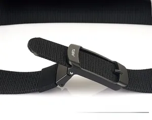 Detail of matte black buckle and nylon webbing showing adjustable length and durability