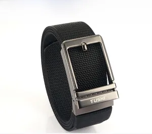 Detail of black nylon woven belt featuring a dark grey metal pin buckle with matte finish