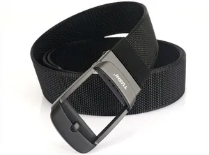 Close-up of TUSHI black nylon belt with matte grey buckle and woven texture details