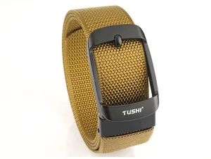Close-up of coyote brown tactical nylon belt with matte black buckle and TUSHI logo