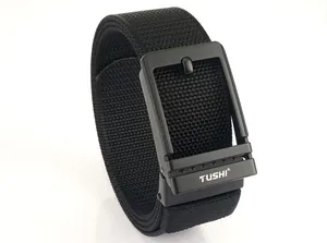 Close-up of black nylon woven belt with matte metal buckle and TUSHI logo detail