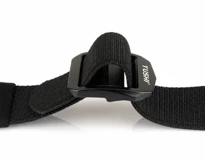 Detail of adjustable black tactical nylon belt with TUSHI plastic buckle and textured webbing