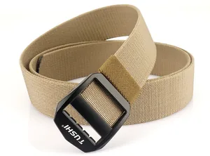 Close-up of matte black metal buckle with TUSHI logo on khaki tactical nylon belt