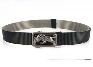 Detail of heavy duty nylon tactical belt featuring a metal automatic buckle with tiger relief